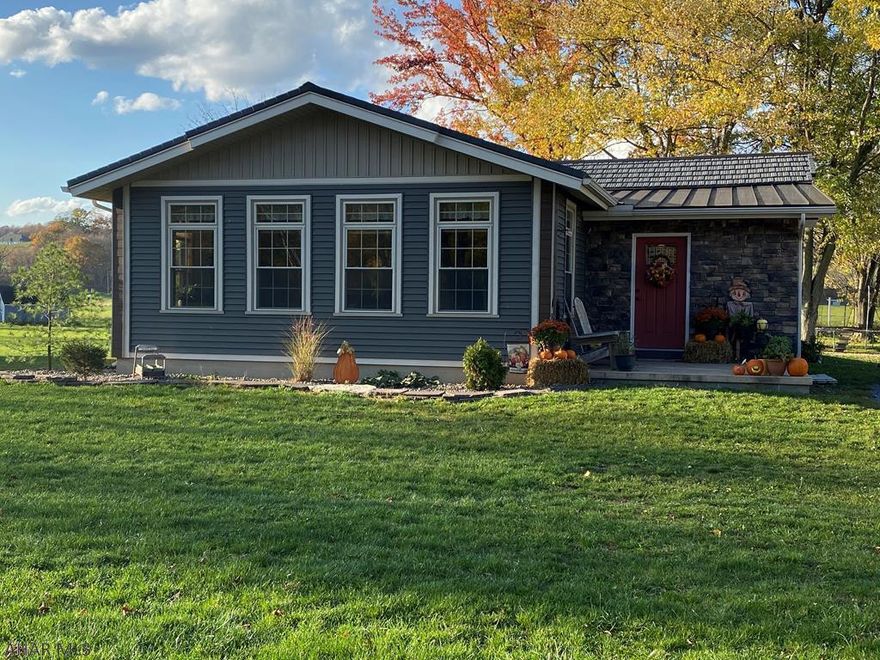 Step inside to this completely renovated home just waiting for you.  Located near Dunnings Creek but no need for concern, this home has an elevation certificate.  Main areas has cathedral pine t&g ceilings, living room has a stone electric fireplace, and the kitchen has cherry cabinets, service island-bar, built-in appliances and so much more. 2-bedrooms with carpet flooring and adequate closets.  Easy access to all amenities, Shawnee State Part, I-99, PA Turn-Pike and points beyond.  Call today for your personal tour.