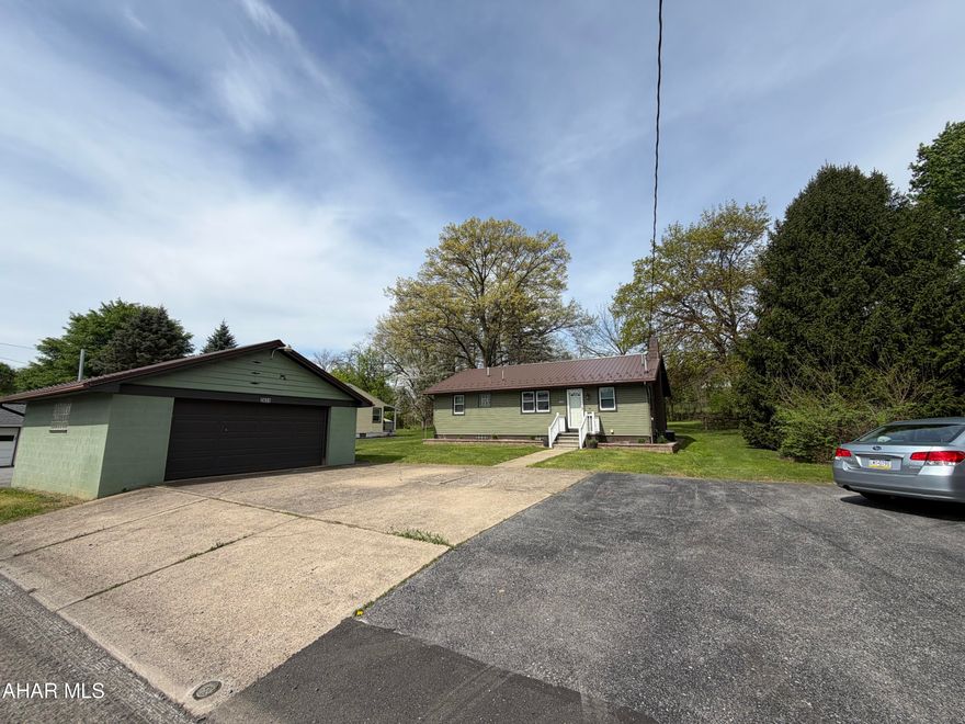 Welcome to your new home!!  Step inside this well-maintained 3 bedroom 1 bathroom ranch style home, tucked away in the City of Altoona on a nice private level lot boasting many updates. This home has an open concept flowing from the kitchen to the dining room into a nice spacious living room. Feel comfortable knowing that your investment is protected with a newer metal roof and vinyl siding. The detached heated 2 car garage had the roof replaced as well. The basement features a bonus room with a bar area, great for family time or entertainment guests. The basement also features additional areas for storage or working on your favorite hobbies!  Last but surely not least, the home has central A/C.  Come see this gem, which is close to all the amenities while still enjoying your privacy. Call to schedule a showing today