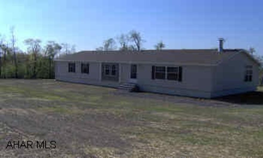 Beautiful new doublewide on 12.40 acres. Great country location! Home is top of the line. Many added features-home entertainment system, fireplace, security system, too much to list! Call for details.