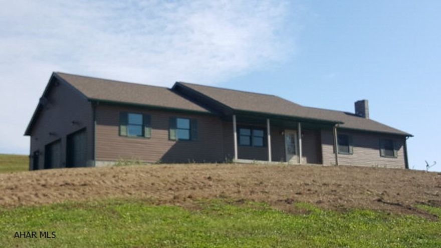 Make sure and SEE THE 3D TOUR on this listing!!  Very well maintained, 4 bedroom 2.5 bath home situated on 8.1 prime acres.  Beautiful Oak kitchen with island, as well as spacious dining and living room areas.  Vaulted ceilings, recessed lighting and surround sound throughout.  Relax after a long day on the spacious covered front porch, or on the deck in the rear of the property.  Additionally, the first floor includes 3 bedrooms, including the master bedroom with garden/whirlpool tub. The basement is partially finished, and includes an office, a work out area and a fourth bedroom. The property is vinyl sided, minimizing exterior maintenance.  An over-sized 2 car garage, as well as a very large she are perfect for storing your stuff.  This property is priced to sell.  Call listing agent!