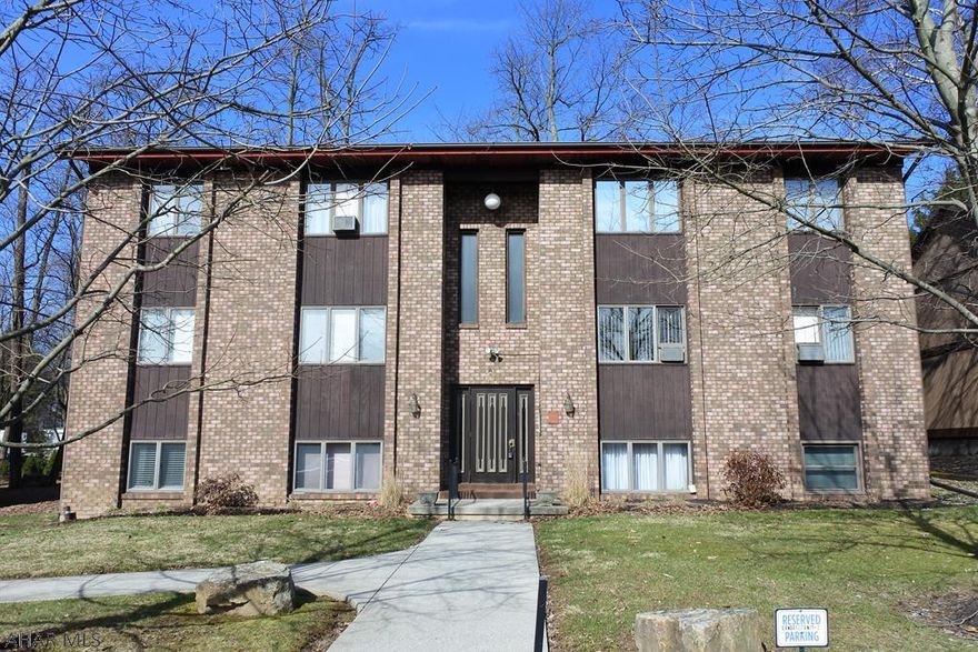 Easy living in this well maintained condo.  Bright and Cheery Throughout, Breakfast Bar in Kitchen (Appliances Stay), Updated Bath, Spacious LR Leads to a Deck.  2 Nice Sized BR's.  Laundry Area is in the Lower Level. Convenient to Shopping and Restaurants. Assoc Fee of $135 a month...includes Water/Sewer, Trash Removal, Lawn Maintenance, Plowing/Shoveling, Exterior Upkeep, Common Area Maintenance and Building Insurance. Amended By-Laws do not Permit Smoking, Children, or Pets. Condo Must be Owner Occupied, Occupants Must be Related....No Rentals.  (Laundry Hook-Up in Bath is not permitted...may be turned into Additional Storage). Reserved Parking Spot.