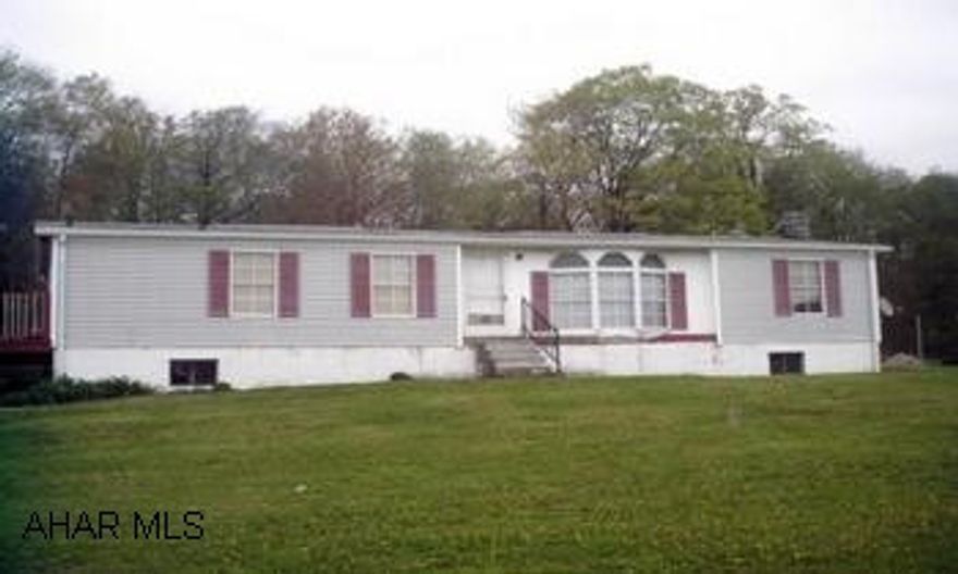 1992 28 X 56 DOUBLEWIDE ON A FULL FOUNDATION. COAL & PROPANE HEAT. SELLER WILL PAY A $1000 BONUS AT CLOSING TO THE SELLERS AGENCY SITTING ON A 1.3 ACRE LOT THIS HOME IS VERY SECLUDED AND IS A GOLFERS PARADISE-- MENT FOR RETIREMENT OR JUST COUNTRY LIVING. SELLER WILL PAY A $1000 BONUS AT CLOSING TO THE SELLERS  AGENCY