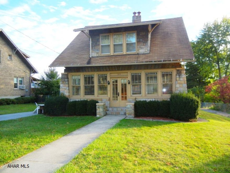 2.5 story Permastone. Double driveway. 5 car garage. Hot water tank new in 2013. Outside fireplace.