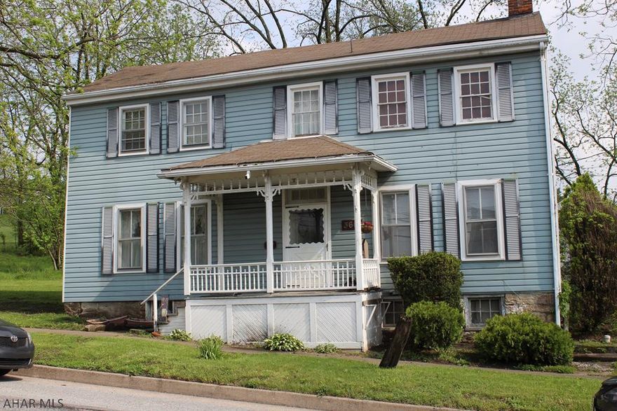 House located in Historic Schellsburg built in 1860.  Many original features that are in excellent working condition.  This home has two stair cases, one grand staircase at the front of the house and the second is in the rear of the house for a private retreat.   Large detached garage, room for two vehicles and storage. This house has newer roof and flue to fireplace, but still needs some TLC.  Historical information regarding the home can be obtained by request.