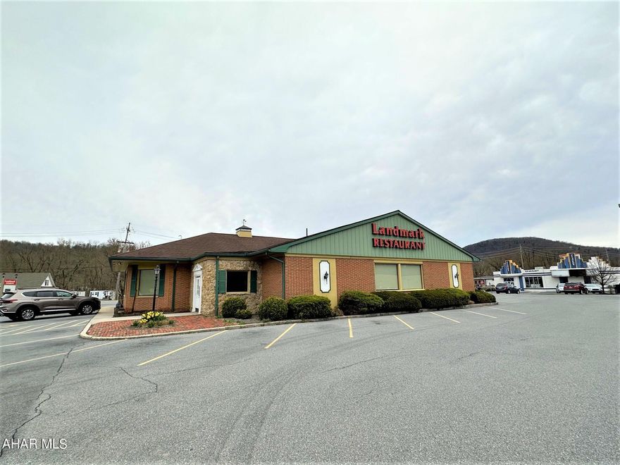 One-story brick building resting on a full basement. Super location just outside the Bedford Borough and in between Pitt and Penn Streets. Large 1.662 acre lot with excellent visibility and exposure. No zoning in Bedford Township. All public utilities on site.