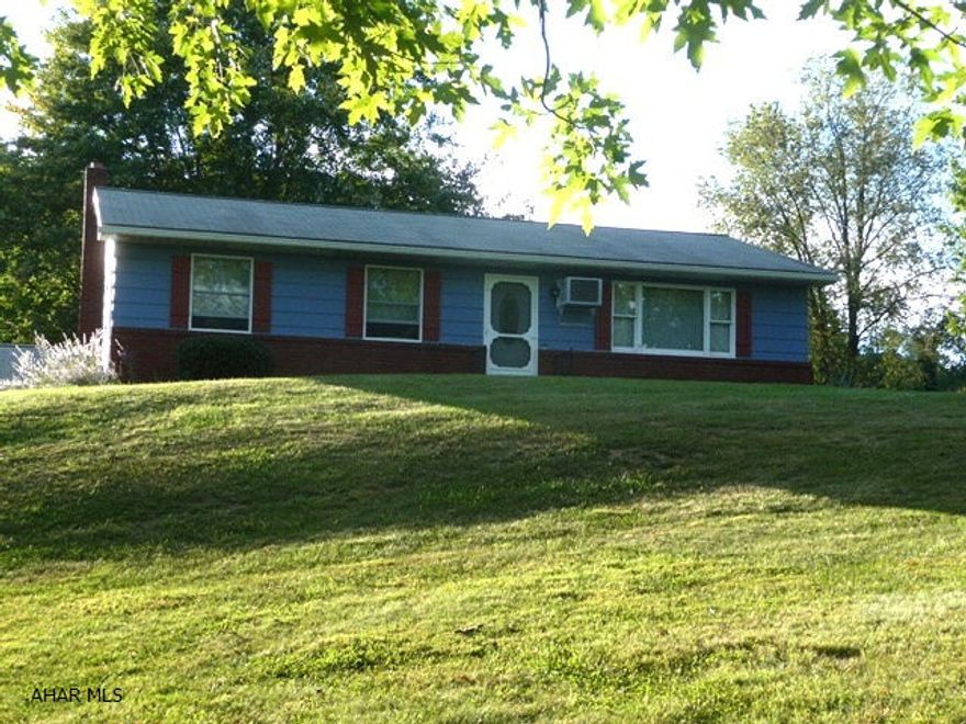 Wonderful quaint 3 BR, 1.5 BA home on 1.7 acres.  The add'l building can be used for a guest suite/office or entertainment area which includes both fridge and range.  Combine that with a wood stove and you have a great additional space. Both the main house and guest house boast wonderful mountain and country views.   If state gamelands are important then this property could not be better as they are within walking distance of the house.  Priced to sell!