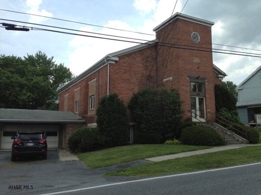 Use your creativity with this former 1834 church (most recently used as an antique store) with a  3 bedroom, 2 bath house/ apartment attached with 2 lots. Total of 0.697 acres. An estate, no disclosures.