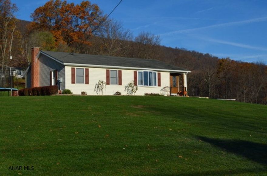 Move-in condition with a beautiful view.  3 Bedrooms & 2 bath.  All new kitchen appliances. Family room with brick fireplace in basement.2.5 miles to town.  Above ground saltwater pool & invisible dog fence.