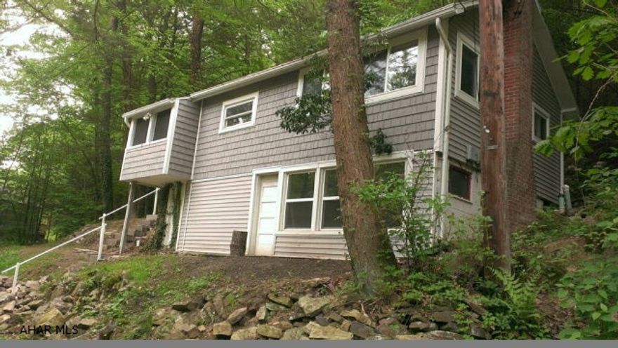 You won't find a better setting on the Juniata River.  2 BD/1BA retreat with wonderful natural light.  Easy access to river from finished walkout basement, priced to sell at $65,000