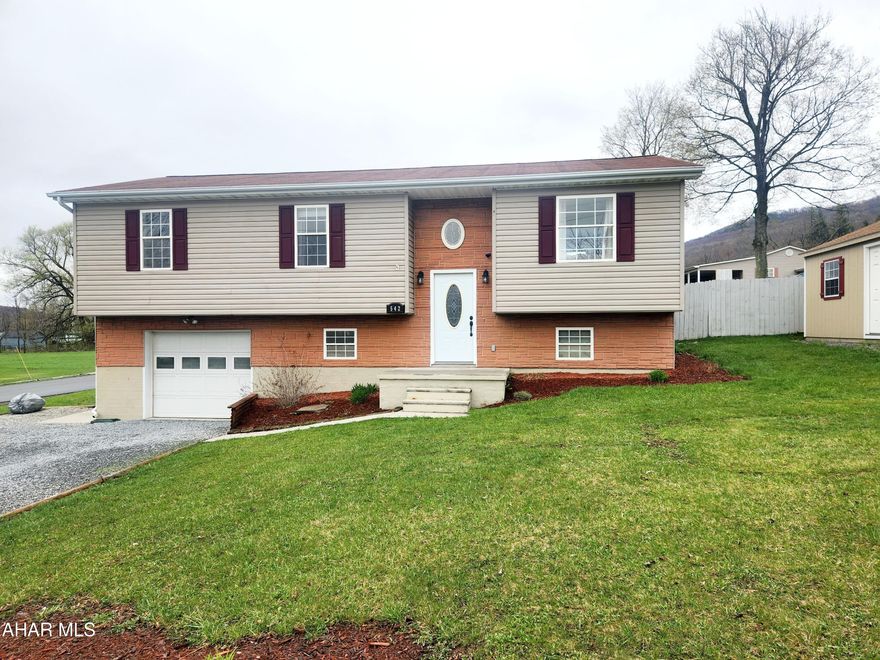 Location, Location! This nicely updated bi-level home in Claysburg is literally right behind the basketball courts and school property. The main level offers an updated eat in kitchen with sliding door to rear deck, living room, full bathroom and three bedrooms. The primary bedroom on main floor offers a private bathroom. The lower level offers a bonus entertaining room and garage. The outside of the home offers a large corner lot with fenced in backyard. Call listing agent for more information or your private tour.