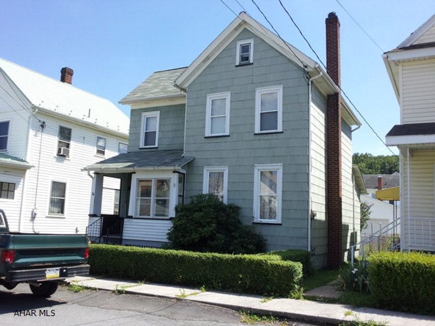 2 1/2 story, 3 bedroom home. Gas HA heating system Enclosed rear porch.