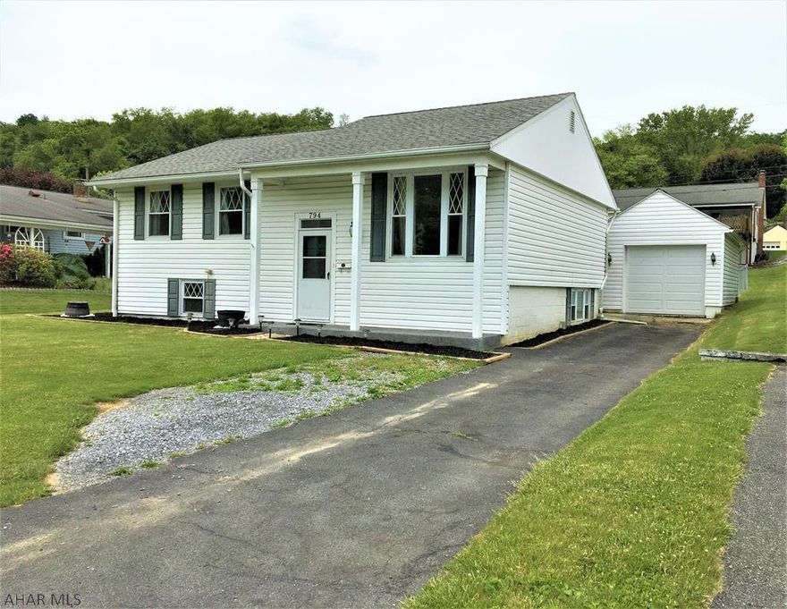 This In-Town Raised Ranch home is much larger than it looks. Open kitchen /dining concept with kitchen appliances included. Three bedrooms with full bath on main level, 3/4 bath with possible 4th bedroom on lower level. Heat pump with F/A heat and central air. Small propane fireplace in lower level family room. One car detached garage with opener. Covered rear deck with a fenced back yard. Within walking distance of all amenities . Be sure to take a look !