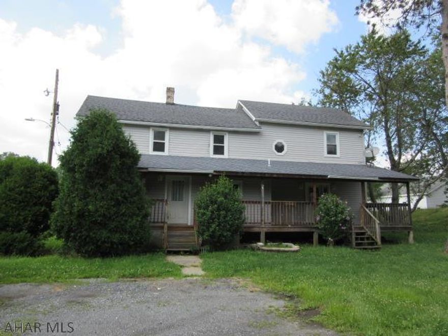 Solid two story on large lot, flexible floor plan, large deck