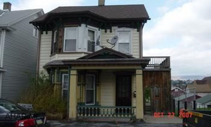 Fenced yard - Off street parking - Room on 1st floor could be bedroom or den - 2nd  floor large family room - Bank    Repo. - Sold "AS IS" - No lights, take flashlight.