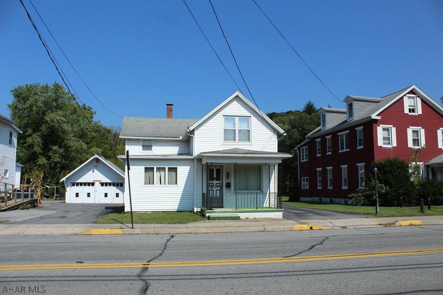 Classic home in Downtown Bedford. Solid wood work throughout, large family room with office space and a nice formal dining room. Kitchen has room for a small eat-in area. 3 bedrooms and a full bathroom upstairs. Two car detached garage and a small apartment building or workshop in the back of property. Located in a commercial area so if you're looking to start a home business, this would be a great property for you. Call today for a showing!