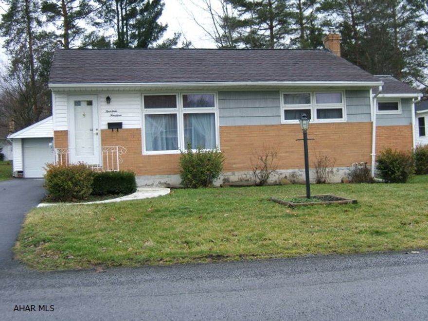 Immaculate, well built and well kept 3 bed 2 bath home.  Large detached garage/workshop can park or store multiple cars. Hardwood floors, new roof, windows, furnace, central air, walk in closet and all appliances. Finished basement has family room, bonus room and large laundry area.   House wired for generator.  Nice level lot in nice neighborhood!