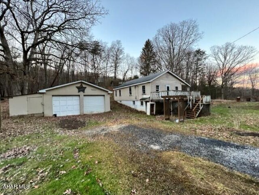 Great investment home.  3 bedrooms with one turned into a laundry room.  Laundry could be moved back to basement.  Ramp accessible.  Two car garage.  Needs TLC.