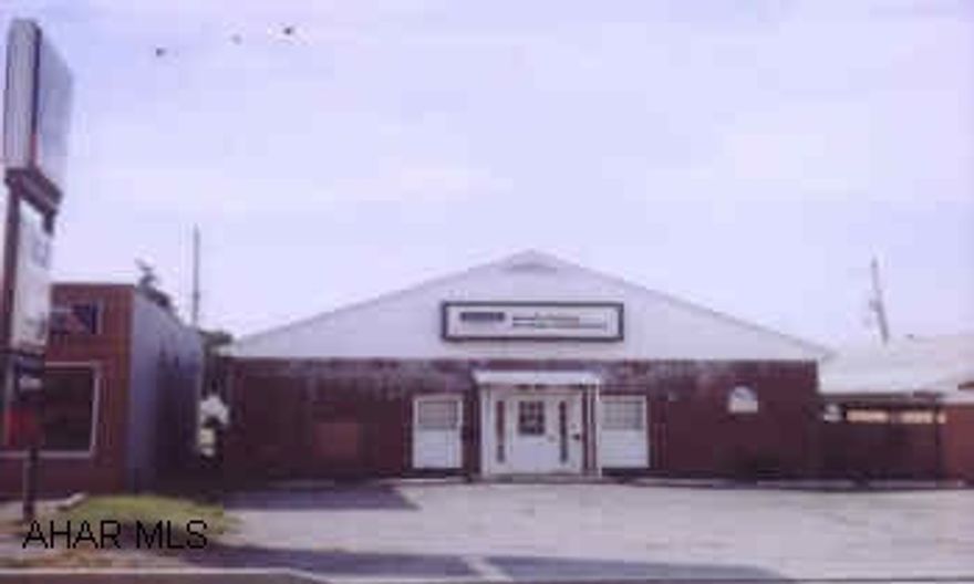 COMMERCIAL BUILDING RIGHT OFF "I-99" FRONTING ON FRANKSTOWN ROAD AND NEAR PLANK ROAD. HIGHLY TRAFFICKED WITH PARKING.