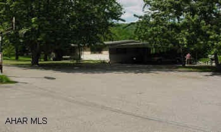 DOUBLE MODULAR ON FOUNDATION ON 19.7 ACRES OF GROUND WITH CARPORT, DETACHED GARAGE AND LARGE 40' X 80' POLE BARN TUCKED AWAY ON A DEAD END ROAD. "REDUCED." FANTASTIC OPPORTUNITY TO HAVE A HOME WITH OVER 19 ACRES OF GROUND, LARGE 40' X 80' POLE BARN, DETACHED 2 CAR GARAGE, INGROUND POOL, ALL ON A DEAD END ROAD IN MAPLE HOLLOW. 3 BR, 2.5 BATHS, FR, SUNROOM (HEATED) 2 CAR CARPORT ATTACHED. 90% IS WOODED. CALL MIKE MANGIA 932-8888.