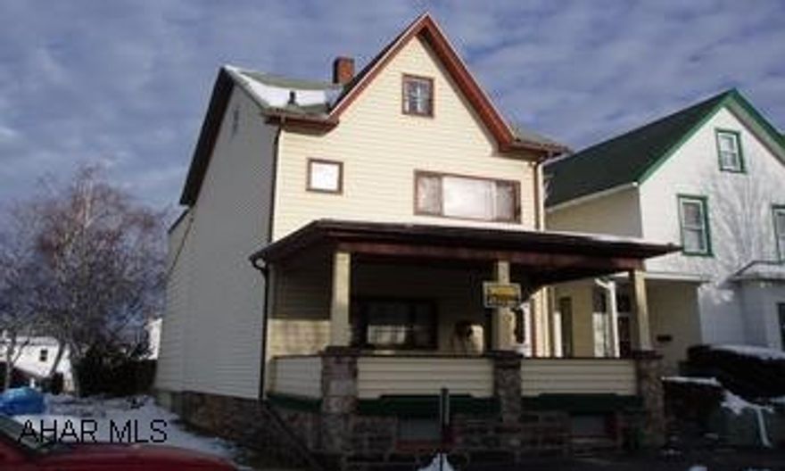 Three bedroom home. Built in shelves in dining room.