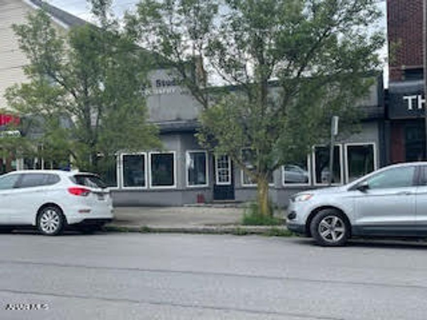 Attractive storefront. Would make a great office.