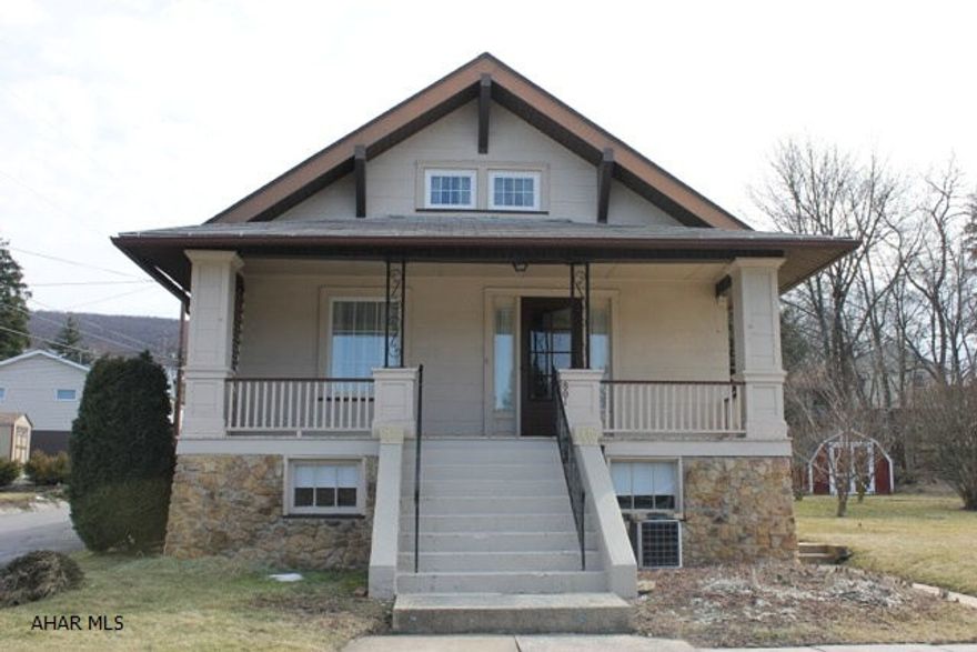 Quaint 1 1/2 story on a large flat 140 x 110 lot in Pleasant Valley area. Enjoy privacy on your patio or the view from the large porch. Plenty of space for outdoor entertaining, a large garden or to add to the home. 2 Car detached garage.