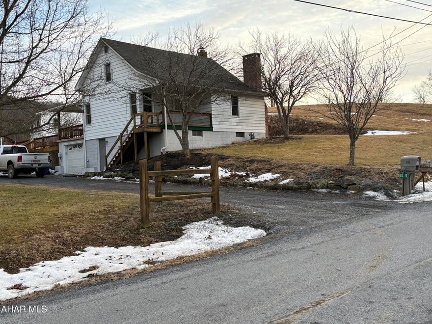 Tucked into the peaceful countryside just minutes from one of Bedford County's most iconic destinations, this charming property offers space, versatility, and opportunity on 2.8 scenic acres. Located only 3 miles from the historic Omni Bedford Springs Resort, you'll enjoy the perfect blend of rural living with close proximity to golf, dining, spa, and recreation.

The main home features 3 comfortable bedrooms and 1 full bath, highlighted by a spacious country kitchen that serves as the heart of the home -- ideal for gatherings, everyday living, and creating lasting memories. Step outside onto the oversized deck, large enough to host a full gathering, where you can take in the quiet surroundings and open skies of Sweet Root Road. The home is ready for a new owner's personal touch, offering the opportunity to make it truly your own while enjoying its solid foundation and peaceful setting.

This property truly shines with its additional living and functional spaces. A two-car detached garage includes a fully equipped 2-bedroom, 1-bath apartment, perfect for rental income, guest quarters, or multigenerational living. Nearby, the large barn with attached lean-to offers solid structure and excellent potential for hobby farming or small livestock such as chickens, making this an ideal setup for those seeking a farmette lifestyle.

Whether you're looking for a primary residence, weekend retreat, income-producing opportunity, or a blend of all three, 496 Sweet Root Rd delivers flexibility, charm, and country character in a highly desirable Bedford location.