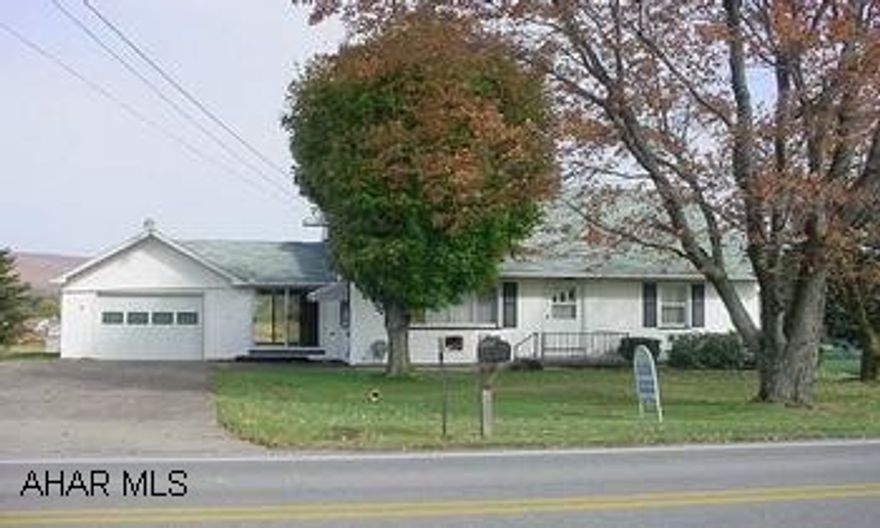 Well maintained Cape Cod home on large lot in a country setting.Newer addition could be den or 4th bedroomw/ electric heat. Enclosed breeezeway with 1 car attached garage to stay out of the weather.  Large eat - in- kitchen too.  Call Ginny Erb.....