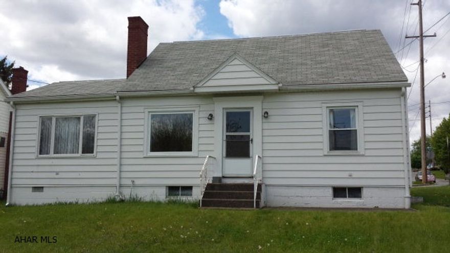 Solid 3 bedroom 1.5 bath in quiet neighborhood.  Beautiful views, large flat yard, wood burning fireplace, all thermo pane windows, oak hardwood floors, family room or office.  Tons of storage.  Clean and dry basement with walkout/Bilco doors.  Professionally cleaned and waiting for you to move in.