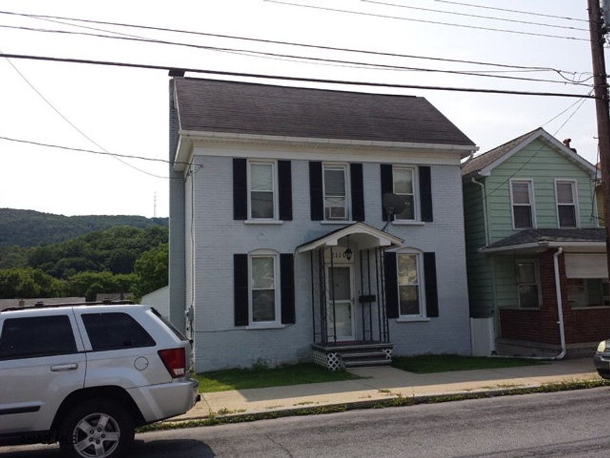 Nice 2 1/2 story, 3 bedroom home with 2 car detached garage. Carport. Fenced yard.