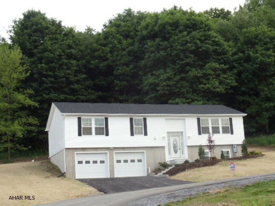 Brand New Construction!  Beautiful split-level with approx 2000 sq ft Finished.  Country setting with nice view.  2-car integral garage & blacktop drive.  J-070