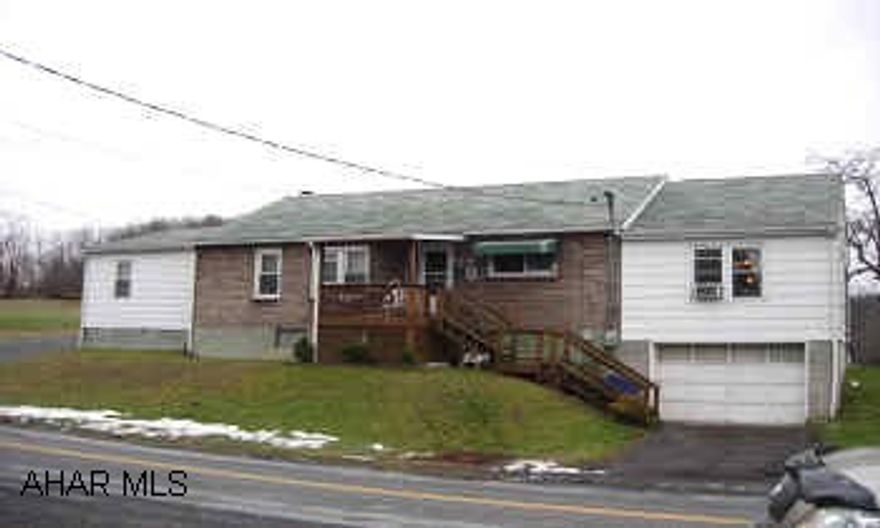 2 CAR DETACHED GARAGE, 1 CAR INTEGRAL GARAGE.  HEAT SYSTEM IS OIL, WOOD OR COAL.  NICE VIEWS.