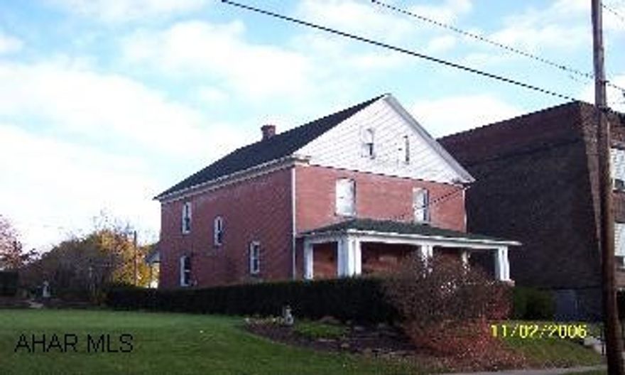 2 story brick, 4 bedrooms, 1.5 baths. 2 porches