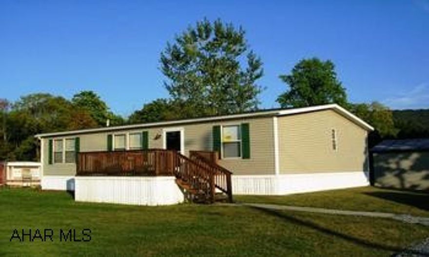 SUPER CLEAN 1994 DOUBLE WIDE ON 1/2 ACRE GROUND. SUPER NICE 1994 DOUBLE WIDE ON LEVEL 1/2 ACRE LOT. HEATED, DETACHED GARAGE, SHED, LARGE DECK. 3 BR, 2 BA, LARGE OAK KITCHEN. NEW CARPET, VINYL, PAINTING. CALL JOE WEBBER @ EST. 124.
