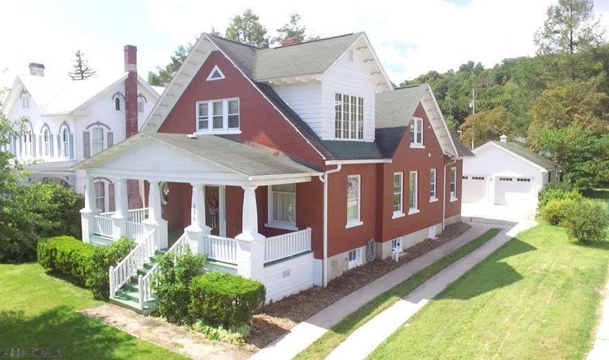 You'll love this gorgeous 2-story home located in the lovely historic town of Bedford.  This 3 bedroom, 3 bathroom home will give you 2,986 square ft of generous space to move about (without losing the quaint, cozy atmosphere when its time to relax and enjoy the babbling waterfall found off the cathedral ceiling family room addition).  Wake up each morning and prepare a meal in a stunning renovated kitchen and then enjoy a cup of coffee on the wonderful covered front porch that will remind you of a different era.  Energy efficient natural gas furnace ,central air and new roof are just a few of the many updates that make this home so special.