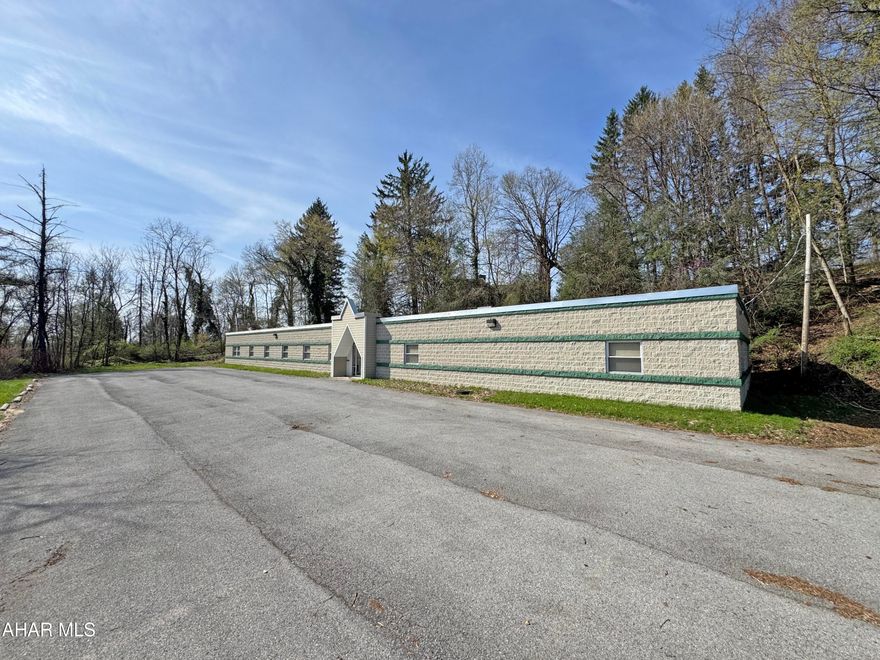 FOR SALE OR LEASE - 6,200+ Square Feet of Modern Office Space available for Multiple Uses all situated on 1.5 Acres in Southmont Boro. As the building is set up currently, Suite A is configured for Medical Services with 5 Exam Rooms with sinks, 4 Large Offices/Conference Rooms, and a Front Office with Reception and Waiting Areas. This unit has 2 Bathrooms. Suite B is configured for Professional/Office Space with 7 Oversized Offices, and 3 Conference/Common Areas. There is also a Kitchenette & Dining Area. This unit has 3 Bathrooms. Each Unit offers separate 200 Amp. Electrical Service and Gas Forced Air Heating/Cooling. Approximately 20 Parking Spaces. THE OWNER WILL ALSO ENTERTAIN LEASE OPTIONS. Call today for more information or to schedule your personal tour!