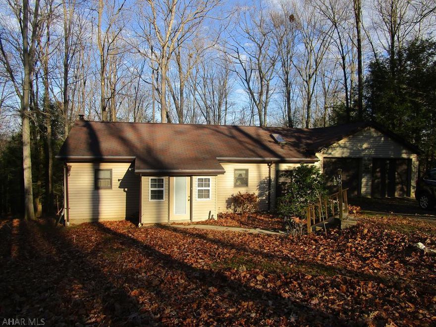 One story 2 bedroom vinyl sided home outside the gate at Glendale Yearound. This well maintained house includes a breezeway and attached 2 car garage. The garage has a finished room behind that could be an office or guest bedroom. Basement has a laundry and 1/2 bath. Generator included for those rare power outages. Large covered rear deck to watch the wildlife from.