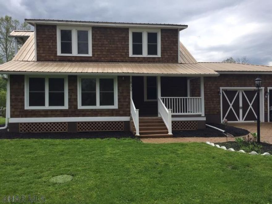 Enjoy the great outdoors with this beautifully remodeled 3 bedroom,2 bath roomy cape cod in Alexandria.Conveniently located close to Raystown Lake and Huntingdon. The home sits on a stamped concrete driveway and has beautiful surroundings. Spacious 2 car garage, large eat in kitchen and lots of room for your family. Large outdoor deck for barbecues and entertaining and a large fenced in yard.