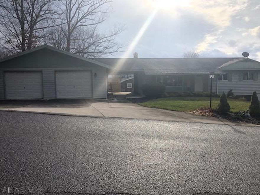 Solid 1-Story Ranch recently remodeled kitchen with new cabinets, new countertops, new stainless appliances, remodeled new bathroom, hardwood floors have been refinished.  Oversize 2-car garage; covered patio from garage to house to keep you out of the weather!  There's a finished basement with additional Bonus Room - could be used for additional bedroom.