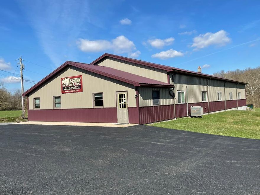Investment property with long-term tenant less than 30 minutes from State College.    Property Features:  Solid well-maintained metal building with over 5000 square feet, finished air-conditioned offices, warehouse space, two loading docks, and situated on 1.25 acres.  Great opportunity with stable cash flow, current lease ends March 31, 2024.  Serious inquiries only, agent and/or owner to be present at all showings.