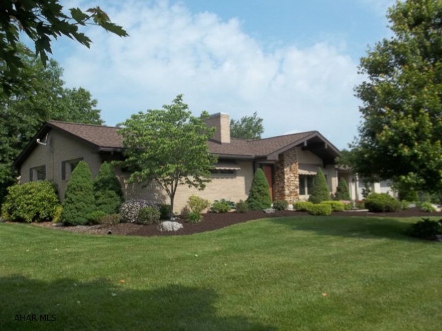 This beautiful custom built ranch has to be seen to be appreciated.  It sits on 1.05 beautifully landscaped  acres with a bright open concept floor plan, 3 BR, 2.5 BA, super finished basement with a bar, kitchenette, laundry, 1/2 BA, beautiful stone fireplace. updated kitchen with Brazilian cherry flooring and newer appliances, beautifully landscaped yard with hard scape and large two story shed in the rear of the property,CA, a heated breezeway connects the house to the two car garage.   This pristine property sits across from the Summit Country Club and golf course and is priced to sell at $259,900.