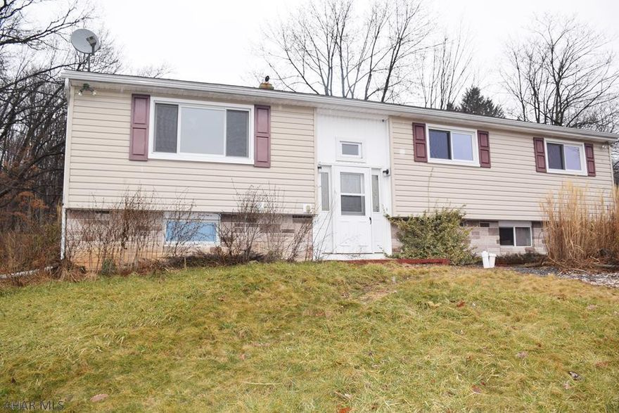 There is so much potential in this bi-level located very conveniently close to shopping at Logan Towne Center and I-99.  Mechanically sound.  New state of the art well system.  Newer furnace.  Grab this one and unleash your mad design skills and creativity to get the home you've always wanted!!