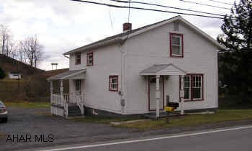 2-Story Frame house, 2BR/1BA with newer roof and windows, oil HW heat, public water and sewer. Kitchen, living room, dining room, foyer with open stairway, large back yard.