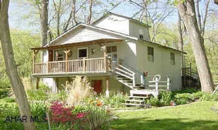 DVB: 315/865, 245/272, 215/180, 313/66 Year round residence or seasonal cottage. Secluded setting with room to grow. Furniture and apppliances included.