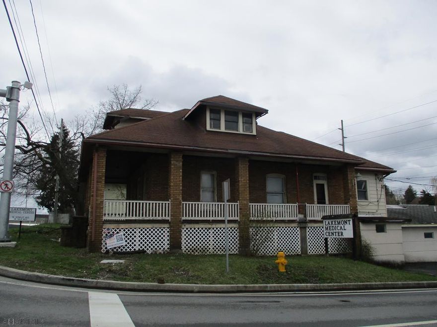 This property has been placed in an upcoming online event. All bids should be submitted at www.xome.com (void where prohibited). All offers received prior to the event period should be submitted by the buyer or buyer's agent by clicking on the 'Make Offer' button on the Property Details page on Xome.com. All offers will be reviewed and responded to within 3 business days. All properties are subject to a 5% buyer's premium pursuant to the Auction Participation Agreement and Terms & Conditions (minimums will apply).This is a commercial building opportunity. This was the former Lakemont Medical Center. The main building was used for offices and has a partial kitchen, full bath, 4 rooms for offices on the first floor. The second floor has a room for another office potentially and an unfinished portion for storage. The main portion of the lower level has three 1/2 baths, 7 former exam rooms, one room with water that was appears to have been a lab, and two other office rooms. The basement has a sump pump. This is a blank slate opportunity to customize the building to fit your needs for someone that wants to invest in a place to make their own. Please bring flash light, as utilities are not on.