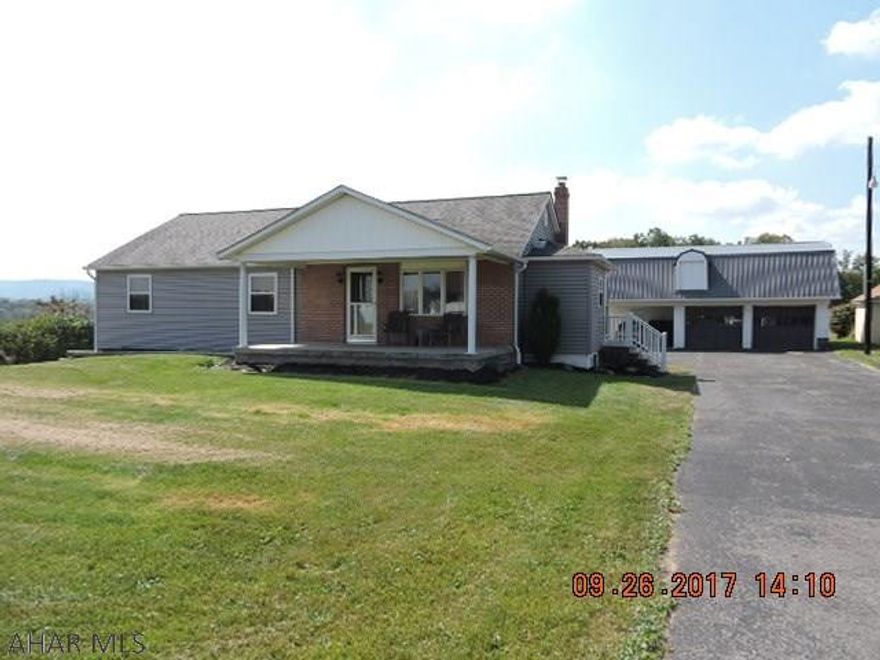 Seller is relocating & forced to give up their dream home.  Gorgeous alder kitchen with top of the line Kitchenmaid appliances, cathedral ceiling, center island, & breakfast bar.  If you admire craftsmanship  & natural wood you will love this house.  Custom poplar doors & trim throughout. & natural paneling.  Man cave in basement has lots of room for exercise equipment & TV'S plus there is a workshop in both the basement & heated garage with 2nd floor..  1-carport attached and a big shed for more storage.