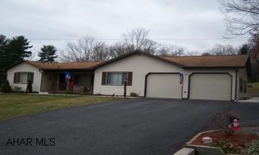 1 story ranch adn two car garage The home consists of hardwood floors throughout, vinyl replacement windows, paved driveway, 2 car garage, large deck, upstairs laundry, screened porch, two new baths, finished family room and rec room in basement with wood burning stove. Also a 12 x 16 shed.