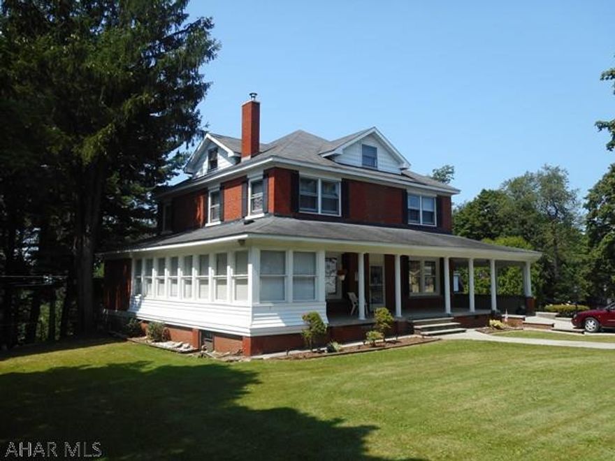 Large Estate home in Colver - truly a landmark property. Situated on approx 3 acres this 2.5 story brick home features 9 rooms with 4 bedrooms and 3.5 baths. There is a finished attac and full basement. Fireplace in the living room with exquisite mantle. The bedrooms are all good sized with wood floors. .75 bath and woodburner in basement. Oil and coal heating systems. Gas line installed to the site. Additional in-law home or apartment on site with full basement, 3 rooms and bath. Concrete drive. Inground pool with concrete apron. Too much to list!  Seller says "Make an offer!"