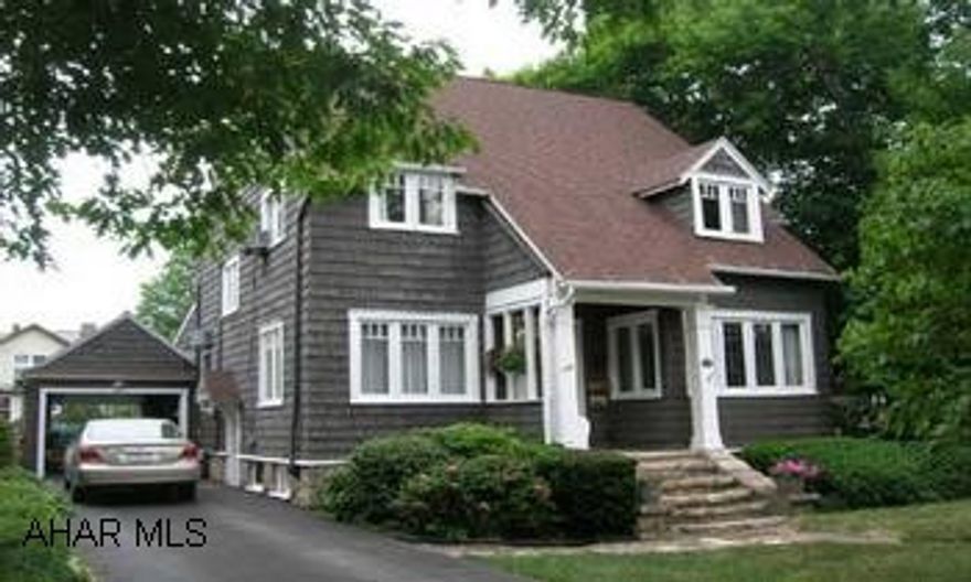 Master bedroom with nursery or 3rd BR. Finished attic. 1st fl den and family room. Cherry kitchen, large deck overlooking inground pool.