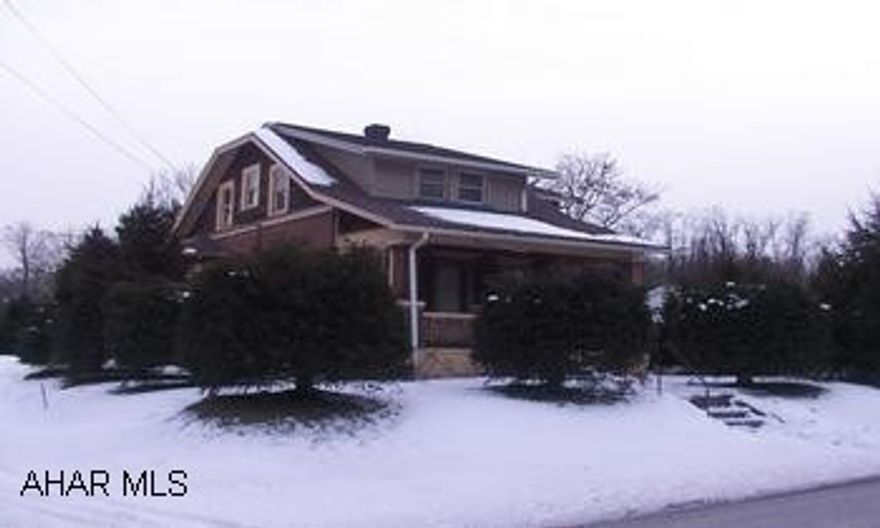 Country cape cod, 3 bedrooms, brick and vinyl.  Newly painted interior, new furnace, hardwood floors.  Large back yard.  Bellwood Schools.  Directions:  River Road in Fostoria.  Three houses from railroad crossing.